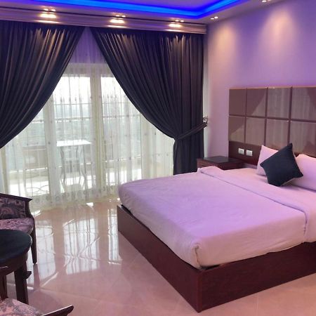 Pyramids Nile Tower Hotel Кайро Екстериор снимка