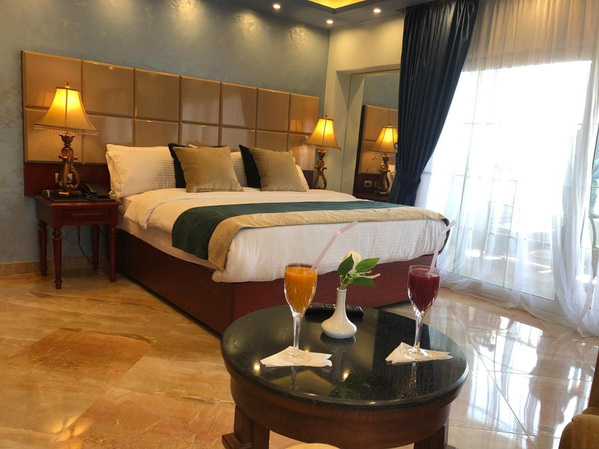 Pyramids Nile Tower Hotel Кайро Екстериор снимка