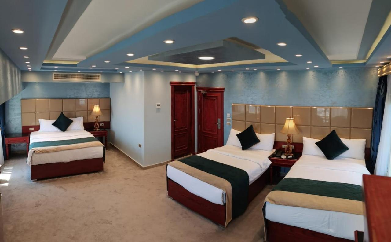 Pyramids Nile Tower Hotel Кайро Екстериор снимка