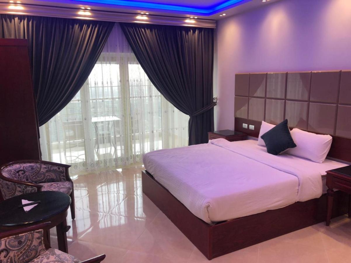 Pyramids Nile Tower Hotel Кайро Екстериор снимка