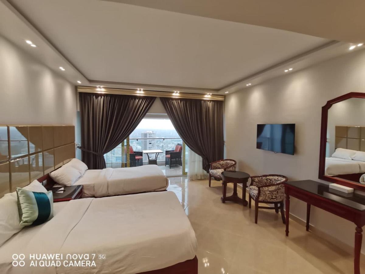 Pyramids Nile Tower Hotel Кайро Екстериор снимка
