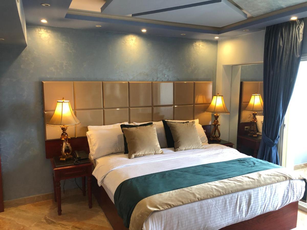 Pyramids Nile Tower Hotel Кайро Екстериор снимка