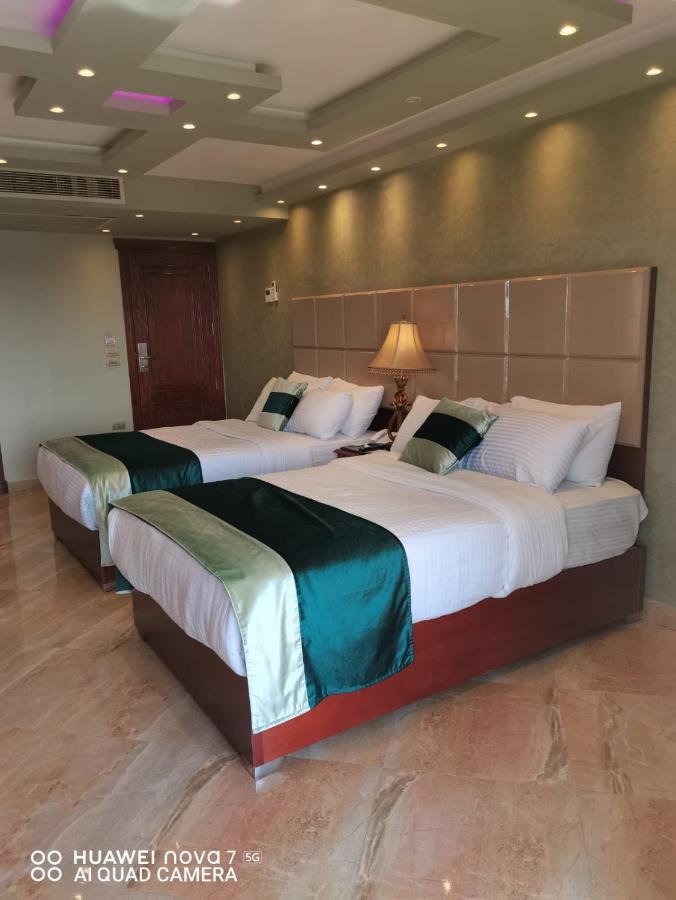Pyramids Nile Tower Hotel Кайро Екстериор снимка
