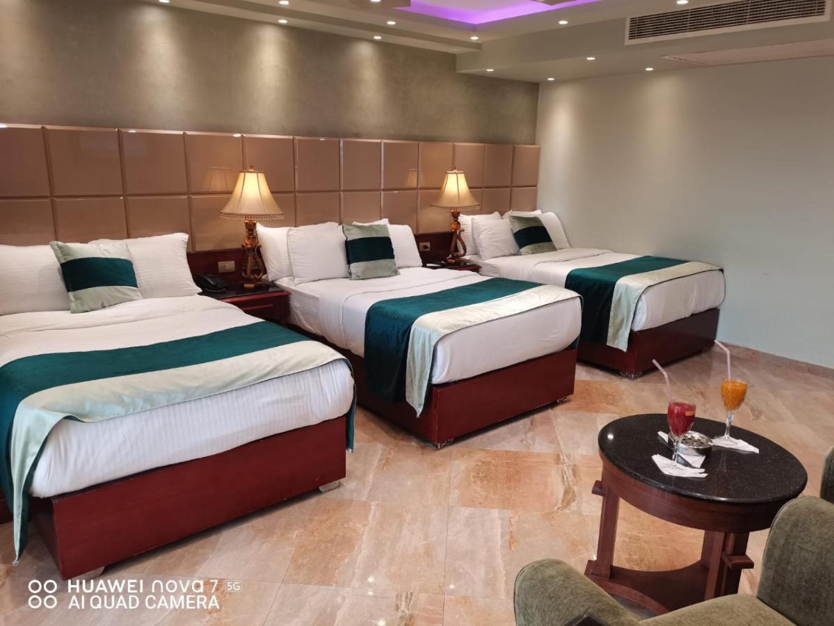 Pyramids Nile Tower Hotel Кайро Екстериор снимка