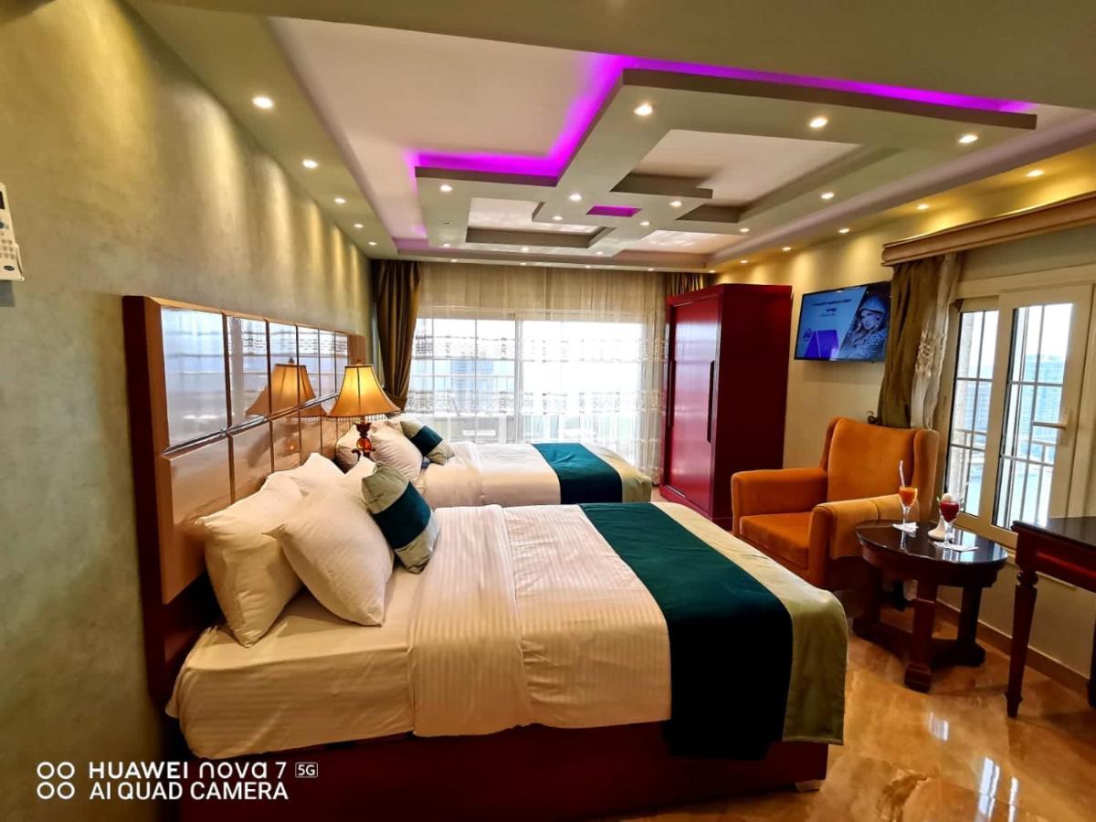 Pyramids Nile Tower Hotel Кайро Екстериор снимка