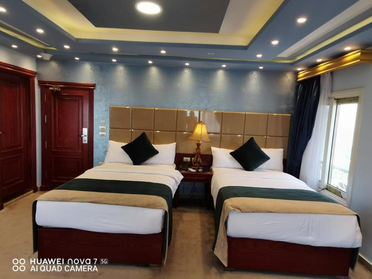 Pyramids Nile Tower Hotel Кайро Екстериор снимка