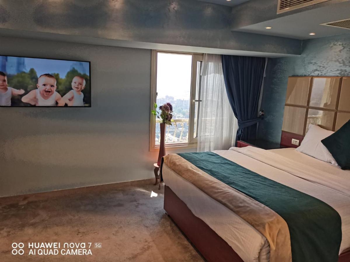 Pyramids Nile Tower Hotel Кайро Екстериор снимка